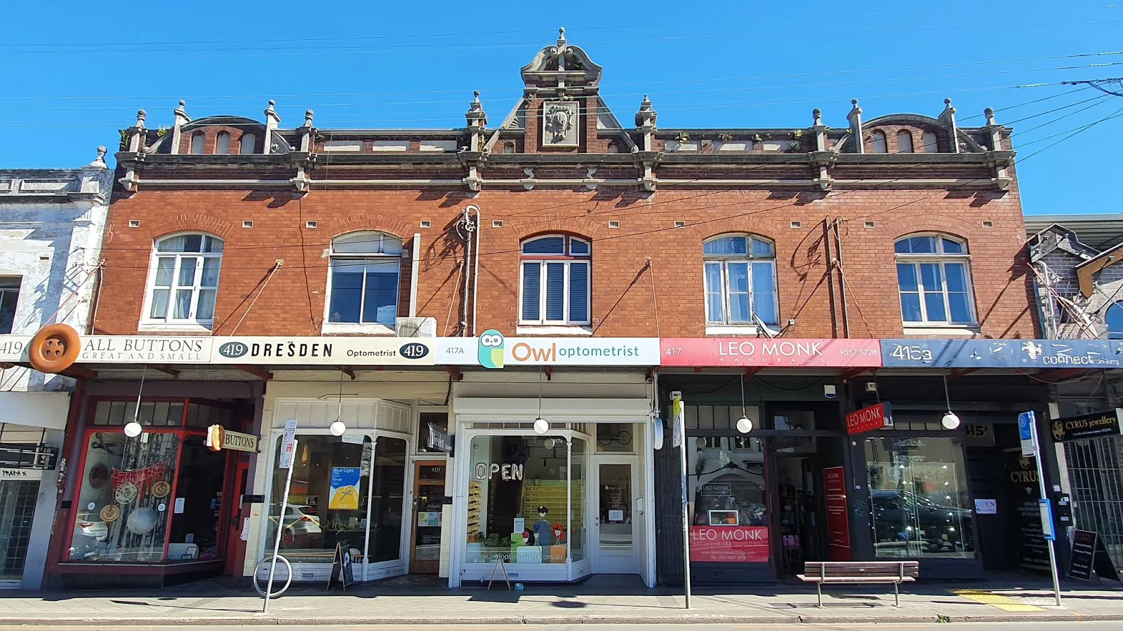 Local main street at golden hour with independent shops